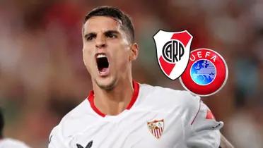 Erik Lamela grita un gol con la camiseta del Sevilla.